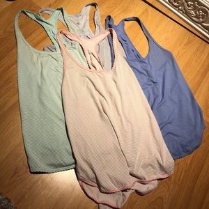 Four lululemon racer tank tops